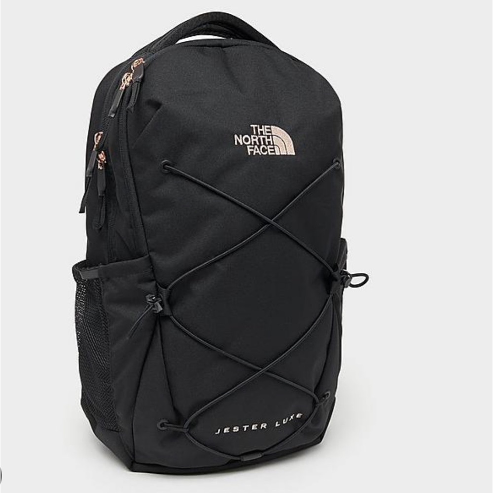 NORTHFACE JESTER LUXE BLACK AND GOLD BACKPACK